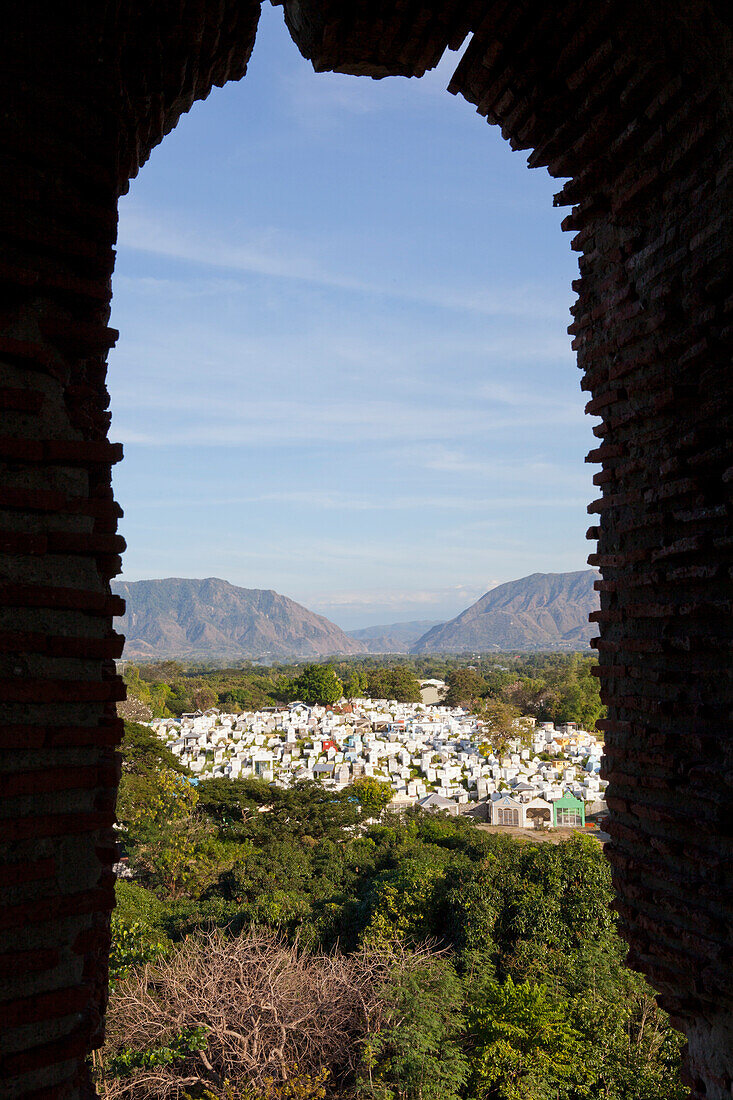 View towards a cemetary and hills from the Bantay Church Bell Tower near the historical city of Vigan, UNESCO World Heritage Site, Ilocos Sur province, on the main island of Luzon, Philippines, Asia