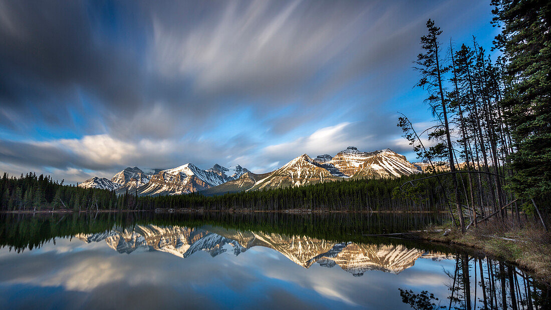 Mountains reflecting in a lake, Banff National Park, Icefields Parkway, Alberta, Rocky Mountains, Canada