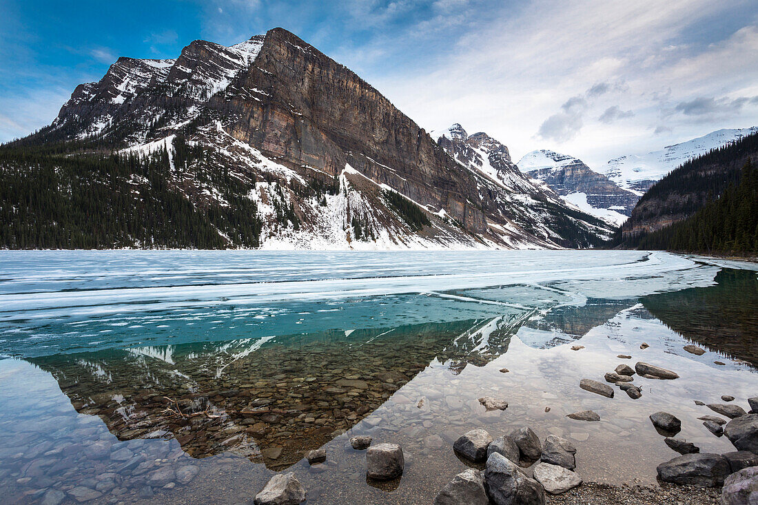 Mountains reflecting in a lake, Banff National Park, Icefields Parkway, Alberta, Rocky Mountains, Canada