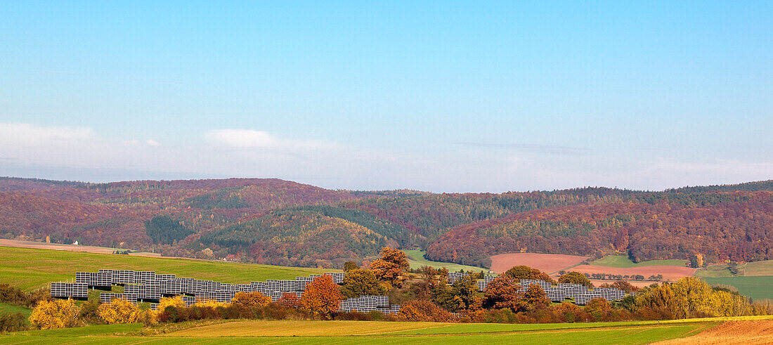 Panoramic of solar park in autumn, Anraff, Edertal, Hesse, Germany, Europe