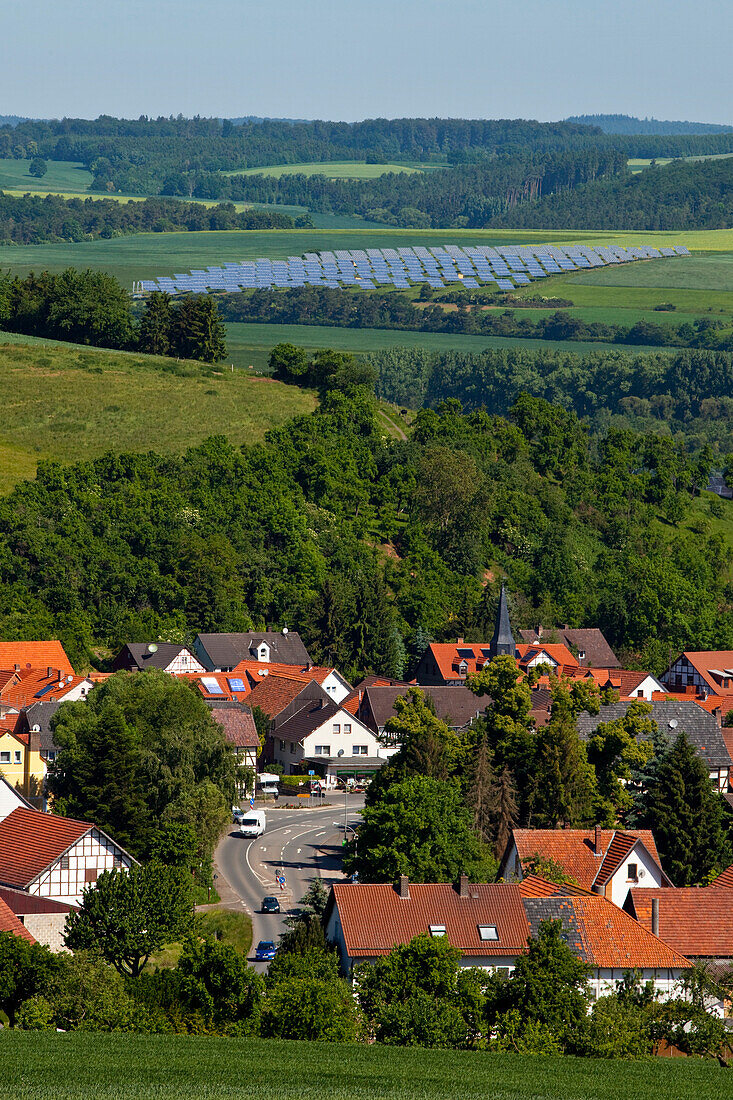 Giflitz village with solar park in background, Lieschensruh, Edertal, Hesse, Germany, Europe