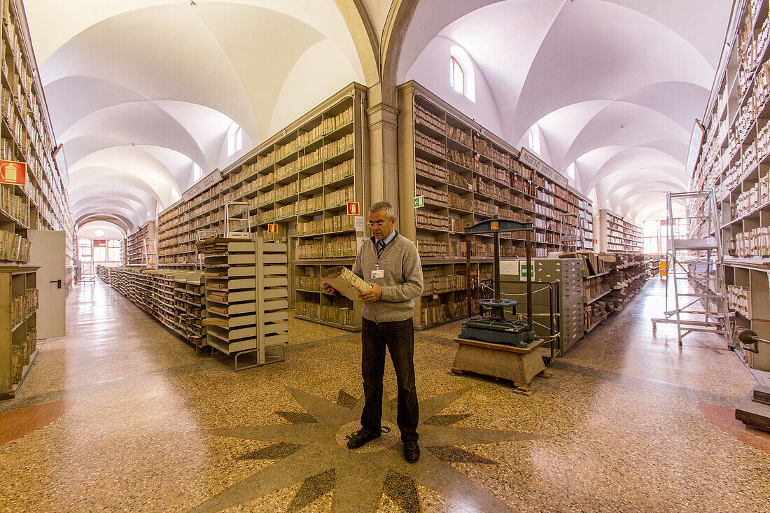 Giovanni Caniato, archivist in city archives, Archivo di Stato, former Franciscan Monastery, documents from Napolean's time, Venice, Italy