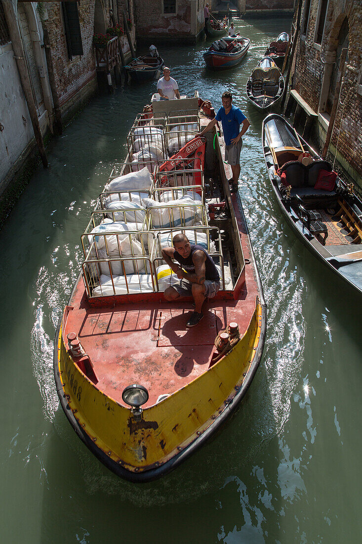 transport barges delivery boats, water transport, hotel laundry, Venice, Italy