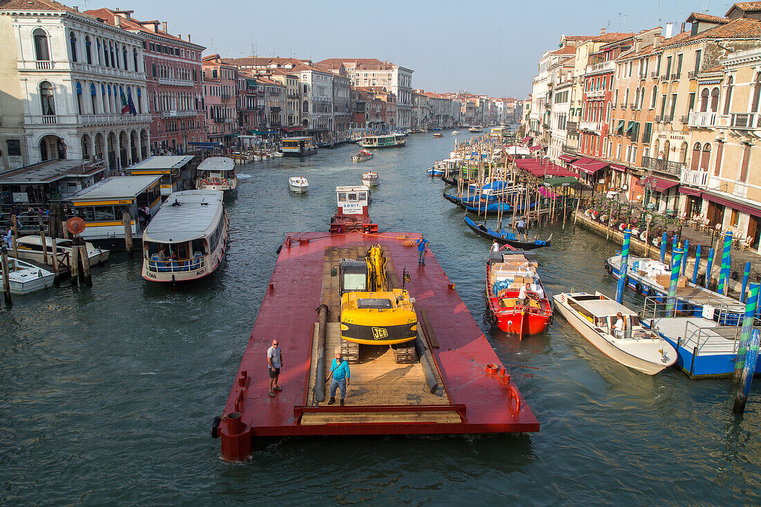 Canal Grande, Grand Canal from Rialto Bridge, barge with heavy machinery, water transport, motor boats, Venice, Italy