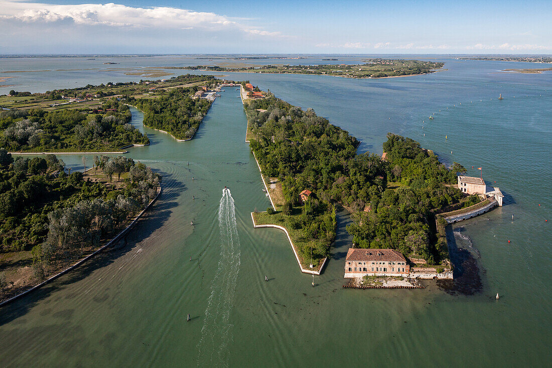 aerial photo of historic fortress island Sant'Andrea built to defend Venice, lstrian stone, uninhabited, lagoon, Italy