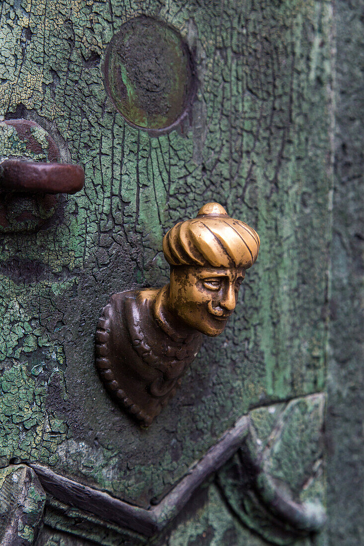 Venetian doorknobs, decorative, polished, worn, Venice Italy