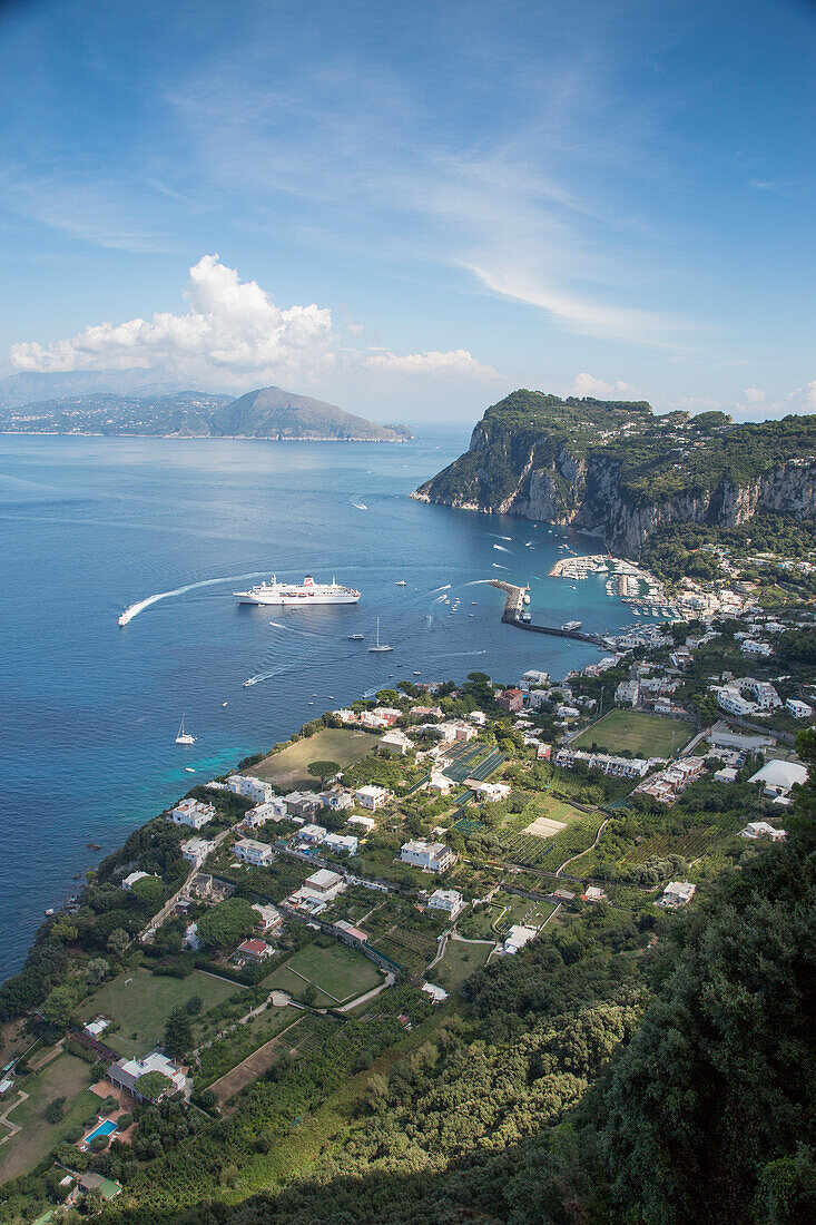 Cruise ship MS Deutschland (Reederei Peter Deilmann) at anchor in harbor, Isola di Capri, Campania, Italy
