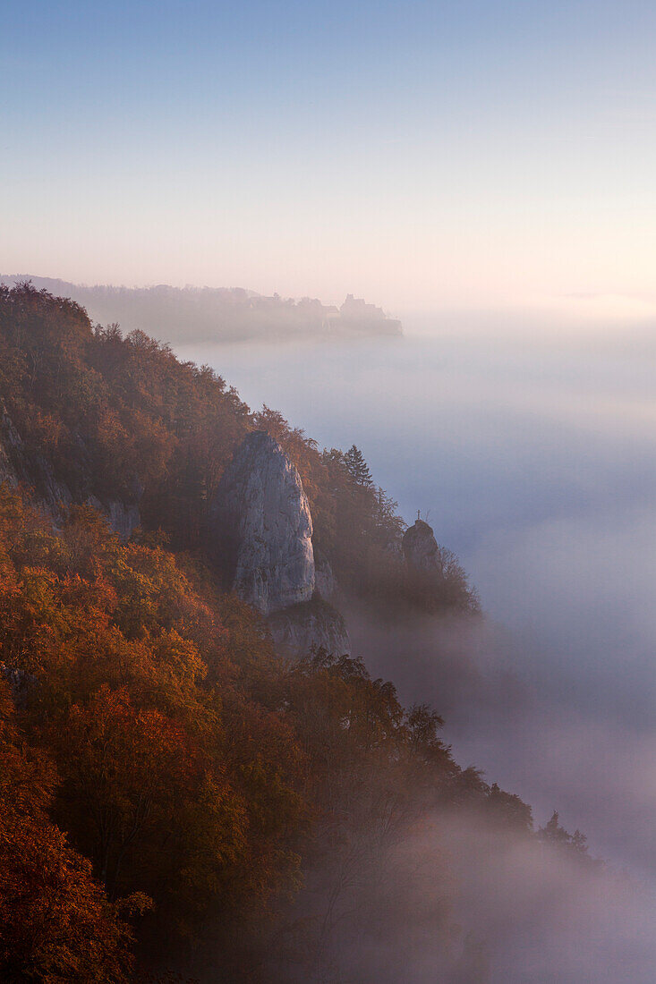 Mist in the valley of the Danube river, view to Werenwag castle, Upper Danube Nature Park, Baden- Wuerttemberg, Germany