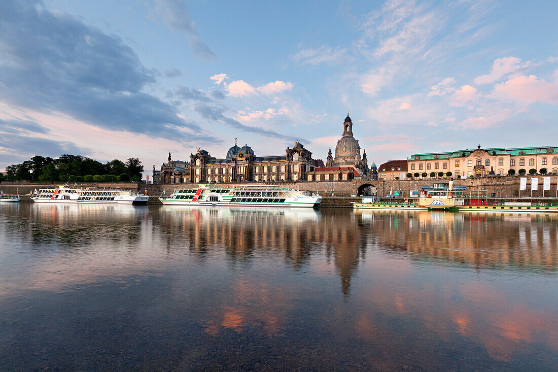 Morning mood, Bruehlsche Terrasse, Frauenkirche reflecting in the river Elbe, Dresden Saxony, Germany