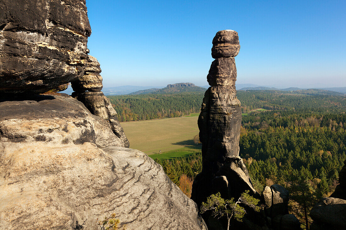 Rock needle Barbarine at Pfaffenstein Rock, Papststein in the background, National Park Saxon Switzerland, Elbe Sandstone Mountains, Saxony, Germany