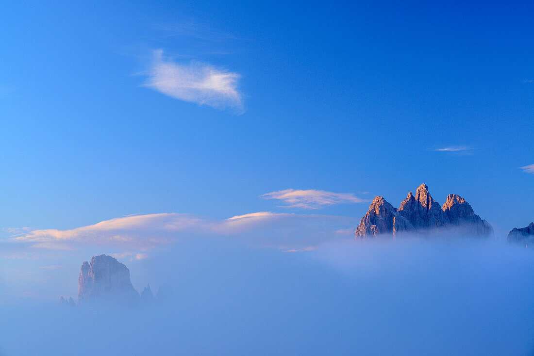 Cadini range emerging out of clouds, Auronzo alpine hut, Auronzo Huette, Drei Zinnen, Tre Cime di Lavaredo, UNESCO World Heritage Site Dolomites, Dolomites, Veneto, Italy