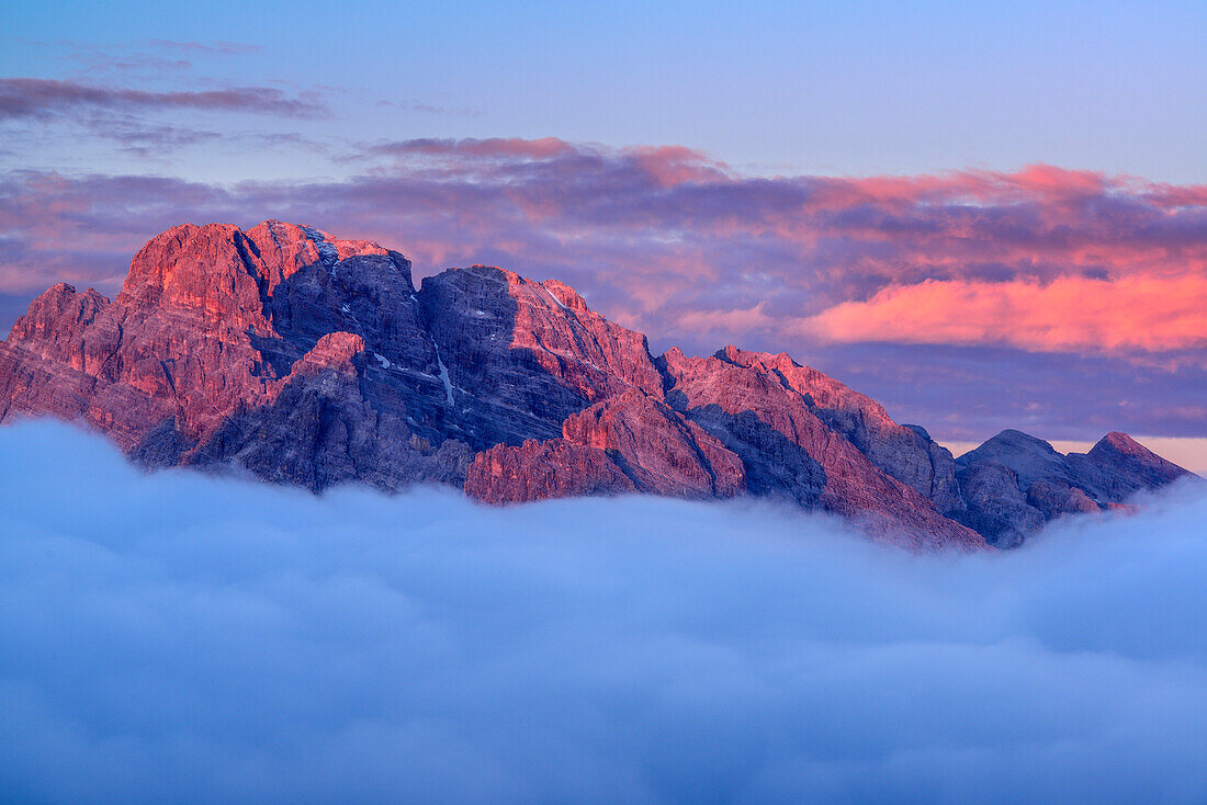 Monte Cristallo emerging out of clouds, hut Auronzo-Huette, Drei Zinnen, Tre Cime di Lavaredo, UNESCO World Heritage Site Dolomites, Dolomites, Veneto, Italy