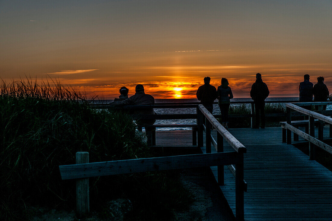 People looking at sunset, Kampen, Sylt, Schleswig-Holstein, Germany