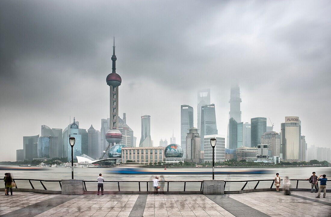 View of the Pudong skyline as seen from the Bund, long exposure, Shanghai China.