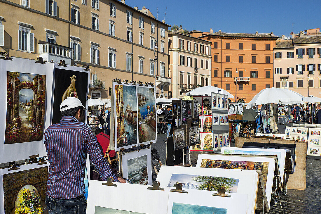 Art vendors, Piazza Navona, Rome, Italy.