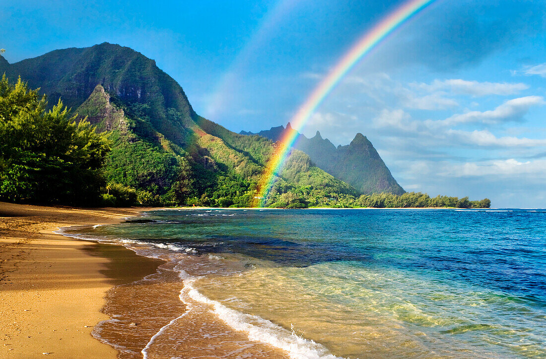 Hawaii, Kauai, Haena Beach Tunnels Beach, Rainbow Over Coastline.
