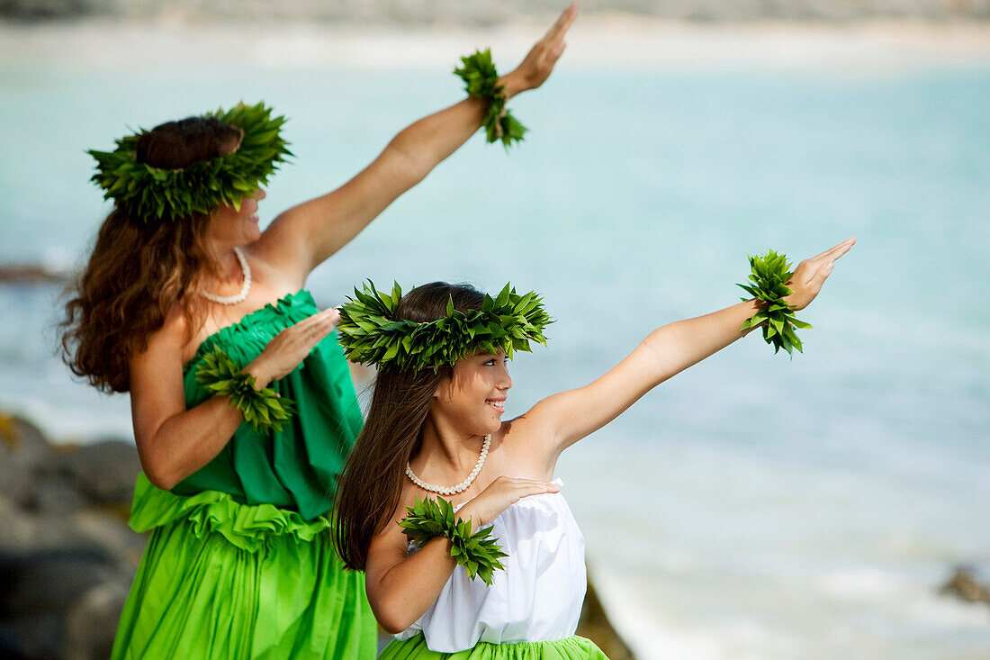 Hawaii, Maui, Mother And Daughter Dancing Hula Together.
