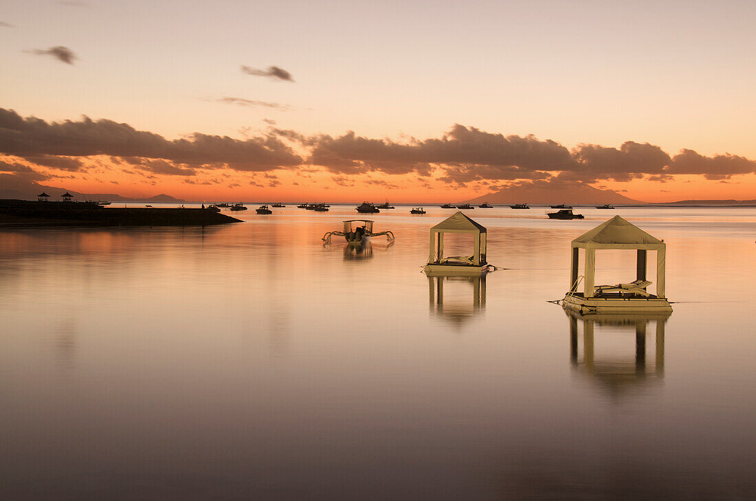 Indonesia, Bali, Sanur Beach, Sunrise, Floating Huts That Can Be Used For Romantic Dinner For Two, Relaxing, Or Special Requests.