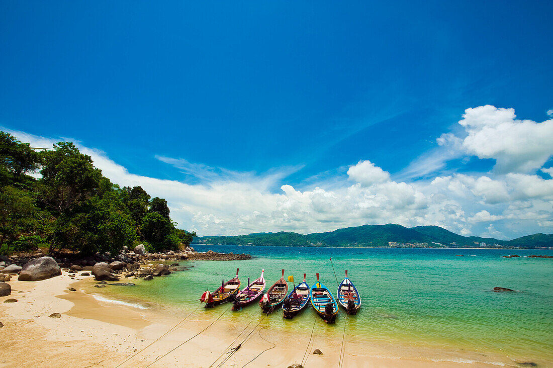 Thailand, Phuket, Paradise Beach, Longtail Boats And Idealic Bay Scene.