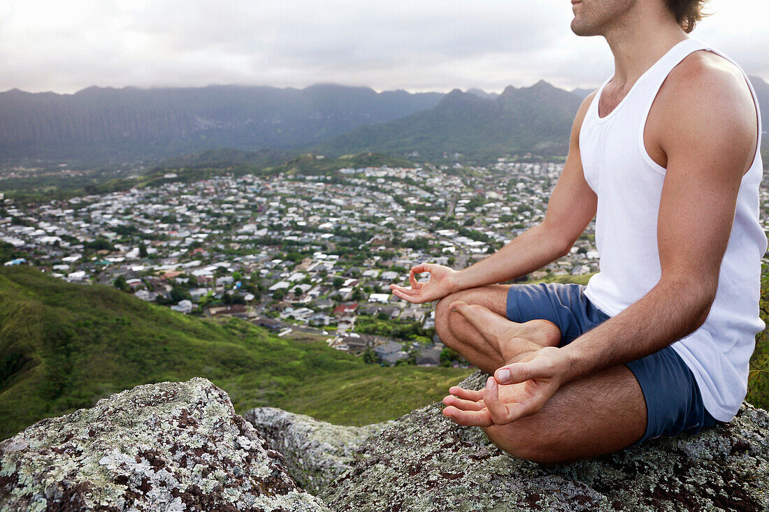 Hawaii, Oahu, Lanikai, Male Hiker Admiring View Of Doing Yoga At The Top Of The Pill Box Hike.