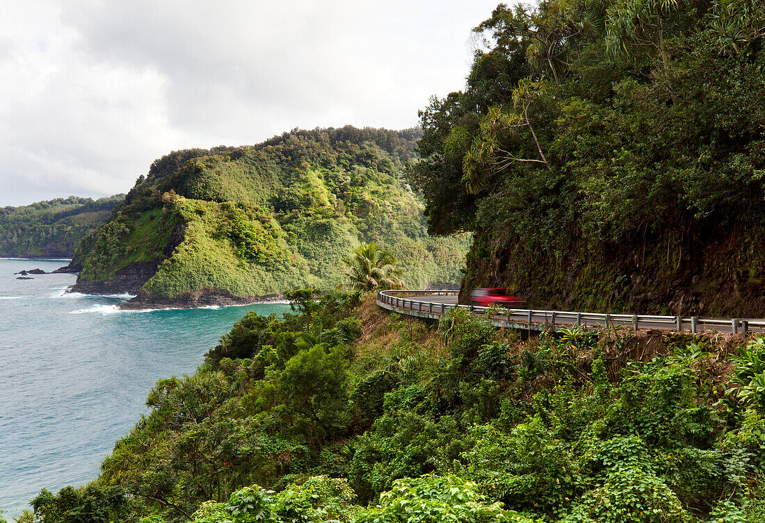 Hawaii, Maui, Car Traveling Along The Cliffs Of Road To Hana.