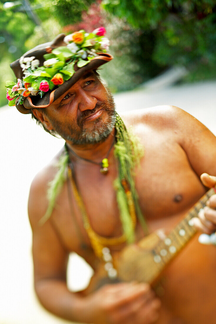 French Polynesia, Tahiti, Maupiti, Local Street Musician.