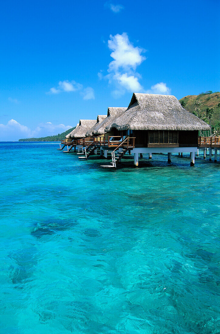French Polynesia, Bora Bora Lagoon Resort Bungalows Over Water, Side View From Ocean C1782
