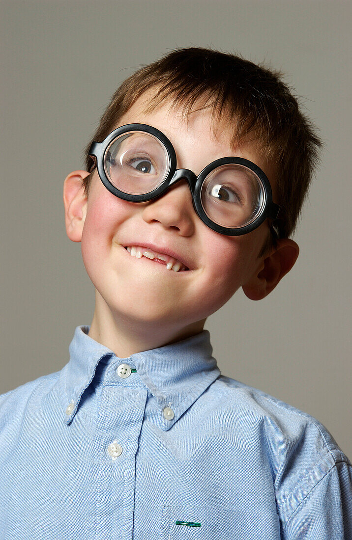 Boy Making Face In Glasses
