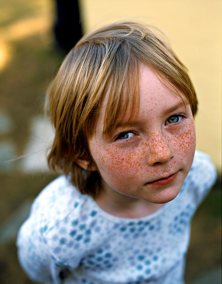 Portrait Of Girl With Freckles