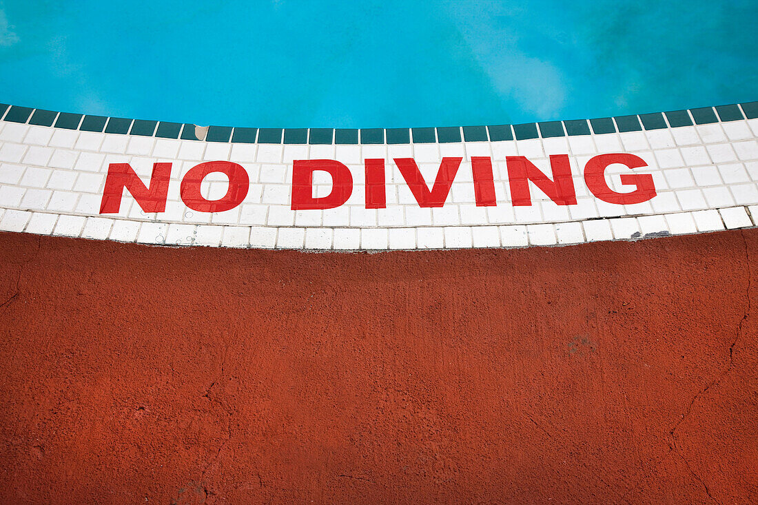 No Diving Notice On Floor Next To Motel Swimming Pool, Vernon, British Columbia