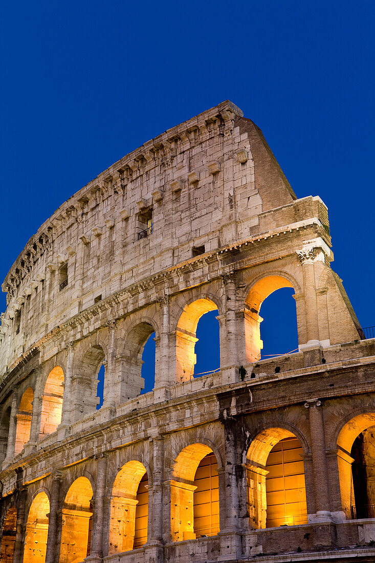 Exterior View Of The Coliseum Amphitheatre At Night, Rome, Italy