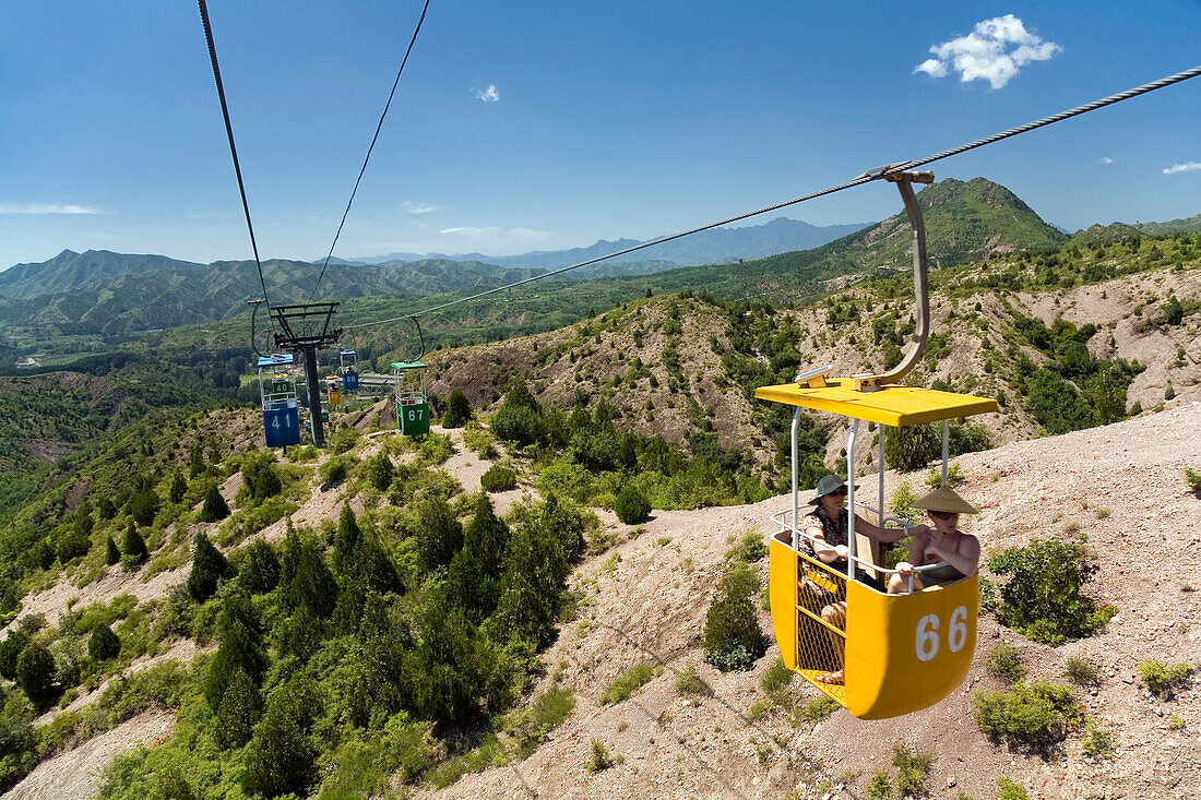 Tourists Ride A Lift To Access The Simatai Great Wall A 5.4 Km Section Of The Great Wall Of China Located In The North Of Miyun County, China