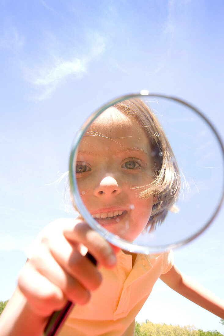 Girl Looking Through Magnifying Glass, Winnipeg, Manitoba