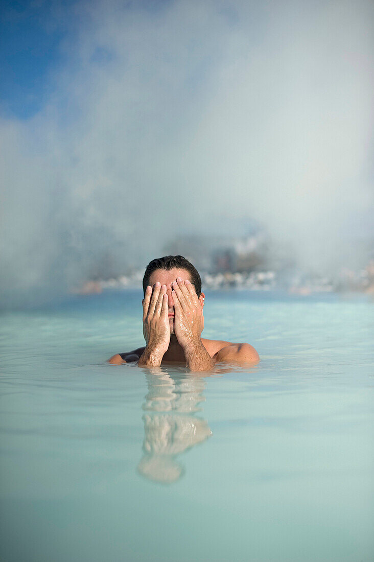 'Man In The Blue Lagoon Geothermal Spa; Grindavík, Iceland'