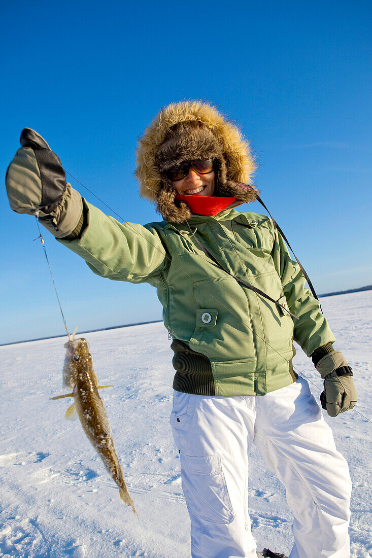 Woman Ice Fishing, Preissac Lake, Quebec