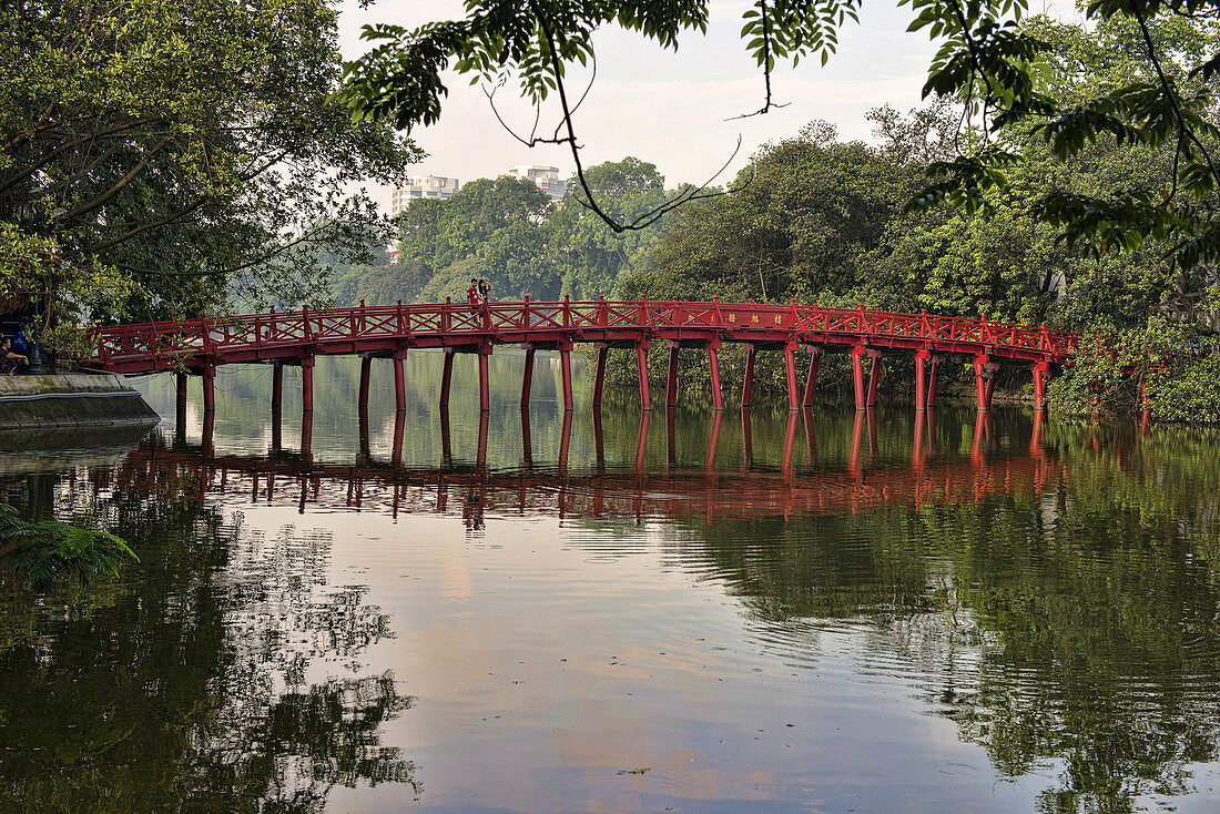 The Huc (Morning Sunlight) Bridge at Hoan Kiem Lake in Hanoi, Vietnam.