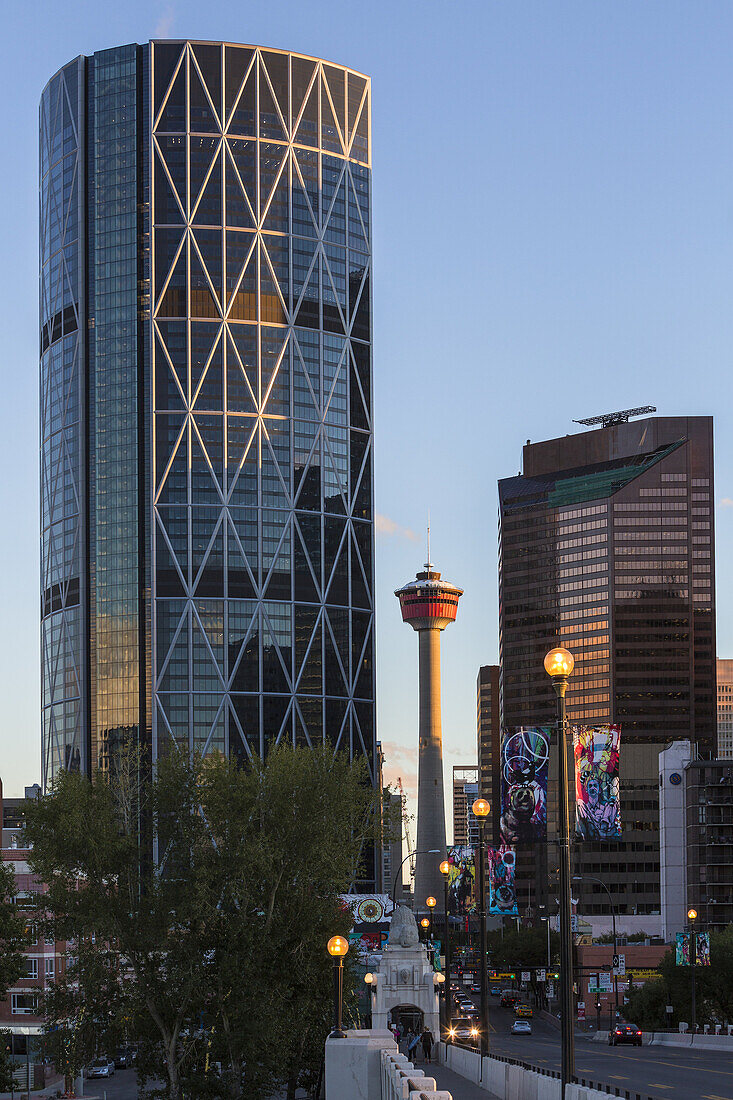 Skyscrapers, Bow Tower and Calgary Tower seen from Centre Street Bridge at dusk, Calgary, Alberta, Canada