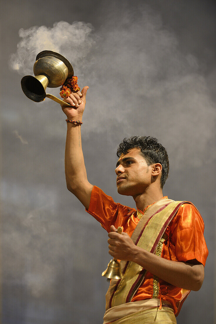 India, Uttar Pradesh, Varanasi, Aarti, Offering of incense to the Ganges.