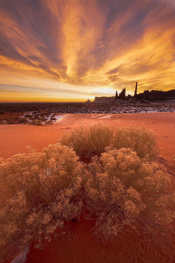 'Winter sunrise over totem formation in Monument Valley Navajo Tribal Park; Arizona, United States of America'