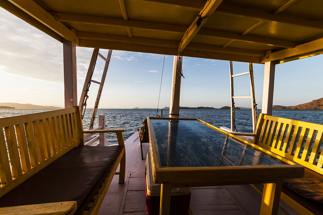 Sunset, as seen from a boat in Kima Bay by Rinca Island, Komodo National Park, East Nusa Tenggara, Indonesia