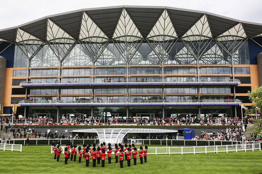 'Military band playing National Anthem prior to Royal procession at the Parade Ring with new Enclosure stand at the Royal Ascot horse race meeting; Ascot, Berkshire, England'