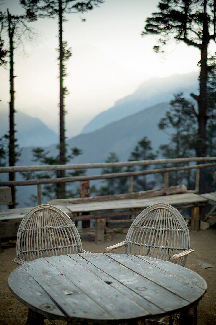A homemade table and chairs adorn the path to Gosaikunda in Nepal's Langtang Region.