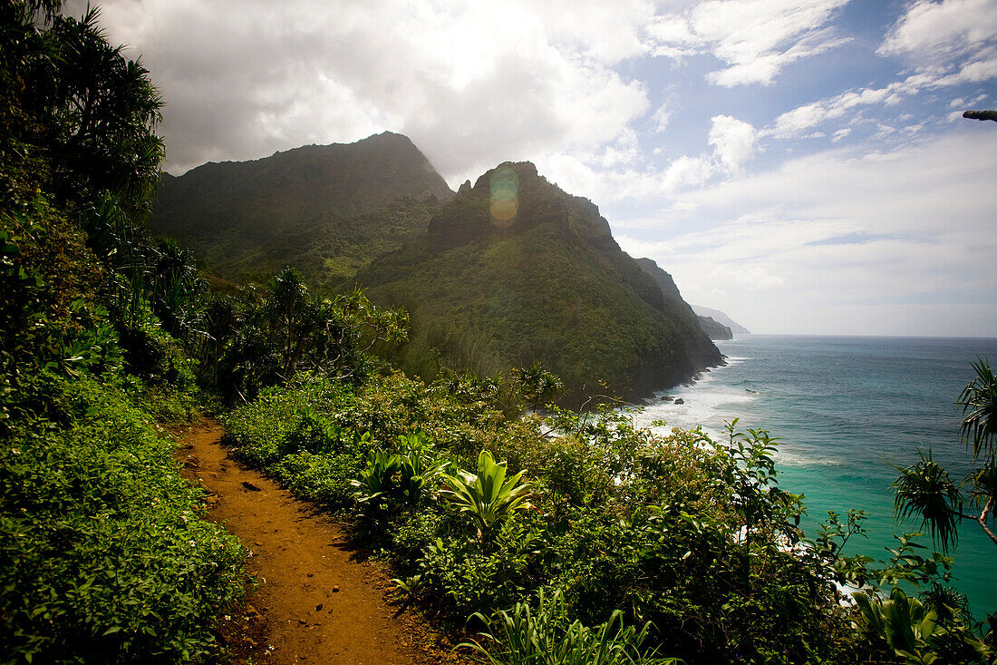 The Kalalau Trail treks along the high sea cliffs of the Na Pali Coast of Kauai.
