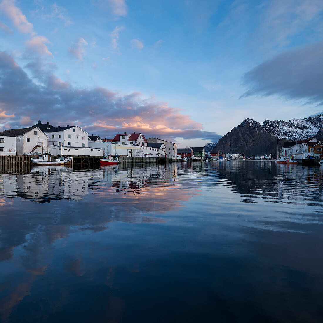 Mountain reflection in Harbour at scenic fishing village of Henningsv?¶r, Austv?•g??y, Lofoten Islands, Norway