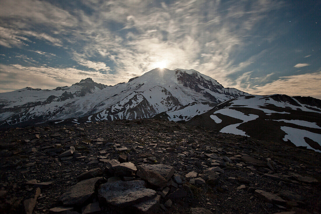 The Moon rises over the NE face of Mount Ranier and the Wintrhop Glacier.