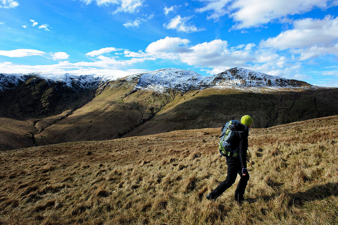 A female hiker at A female hiker at The Loch Lomond & The Trossachs National Park, Scotland, UK.