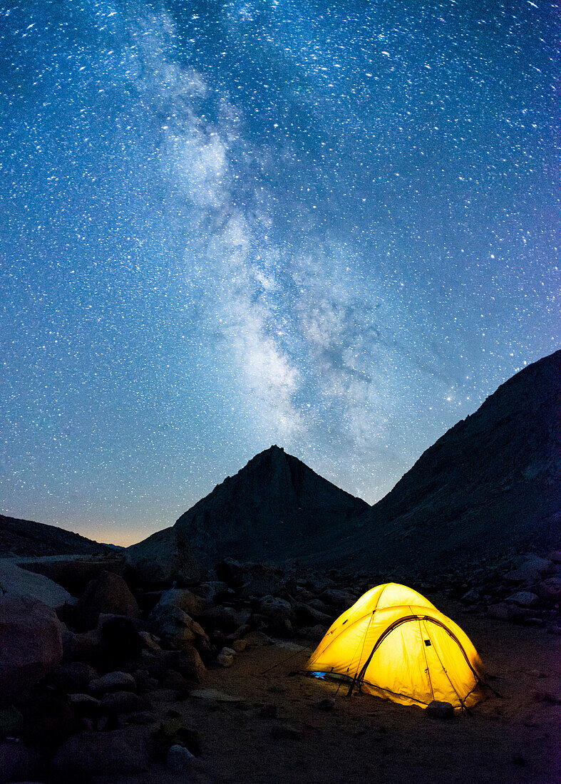 Glowing tent and stars in Royce Lakes area of High Sierra