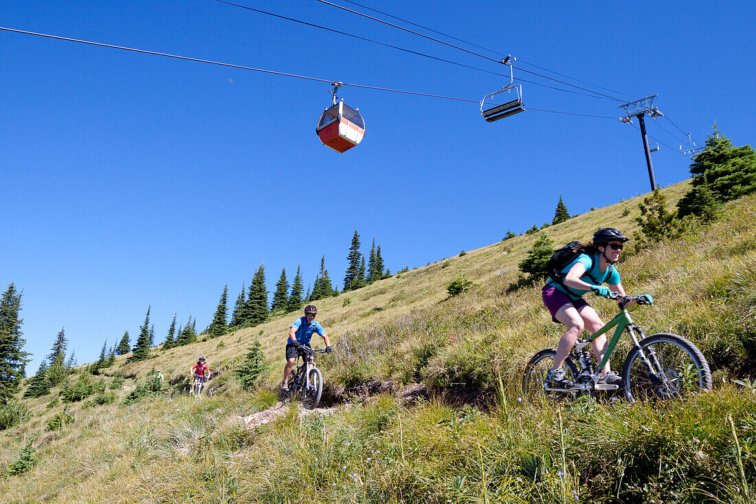 A family ride their bikes in Whitefish, Montana.