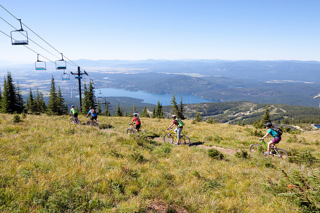 A family ride their bikes in Whitefish, Montana.