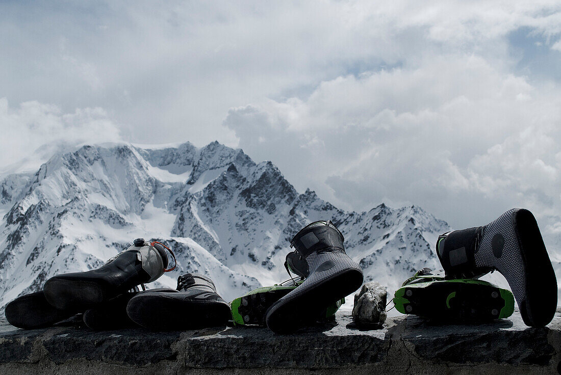Ski boots on the porch of Valsorey Hut in swiss alps.
